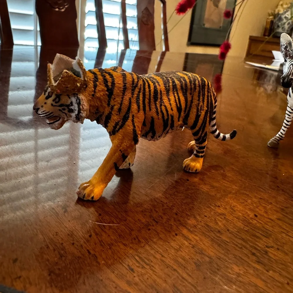 Zebra, tiger, elephant, and Giraffe Figurines